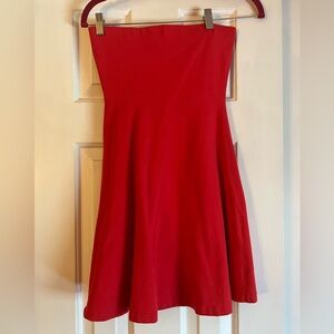 Hot pink strapless mini dress.